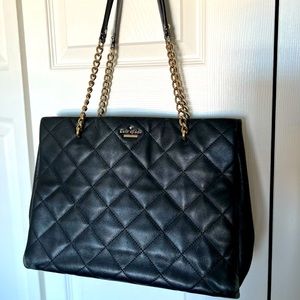Kate Spade black leather quilted handbag. 13” long, 9” tall, 5” wide.